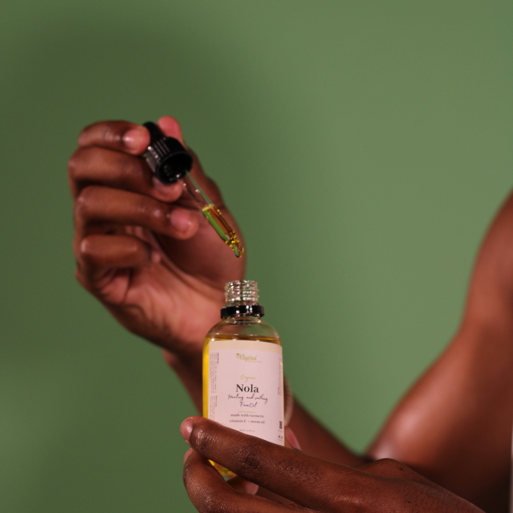 Nola Face Oil texture - lightweight organic facial oil absorption