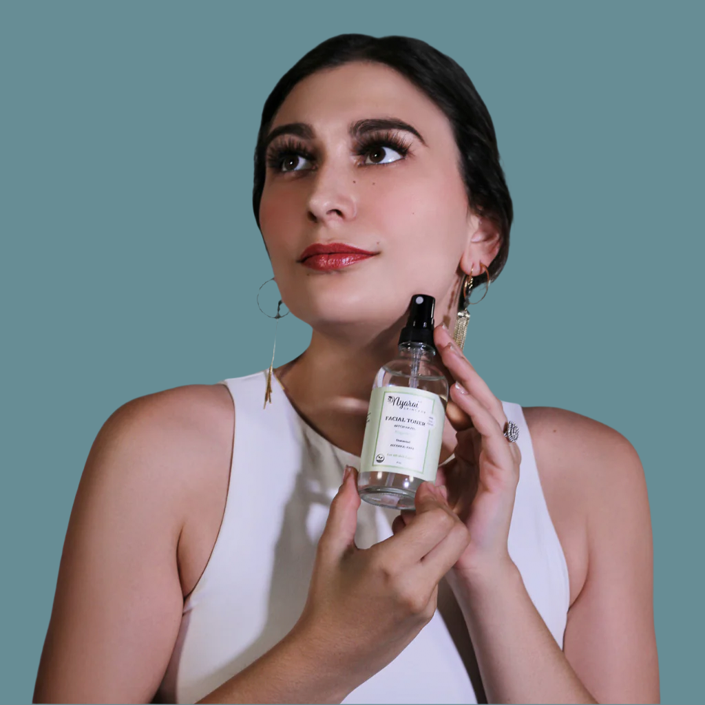 Woman holding Pure Witch Hazel Toner