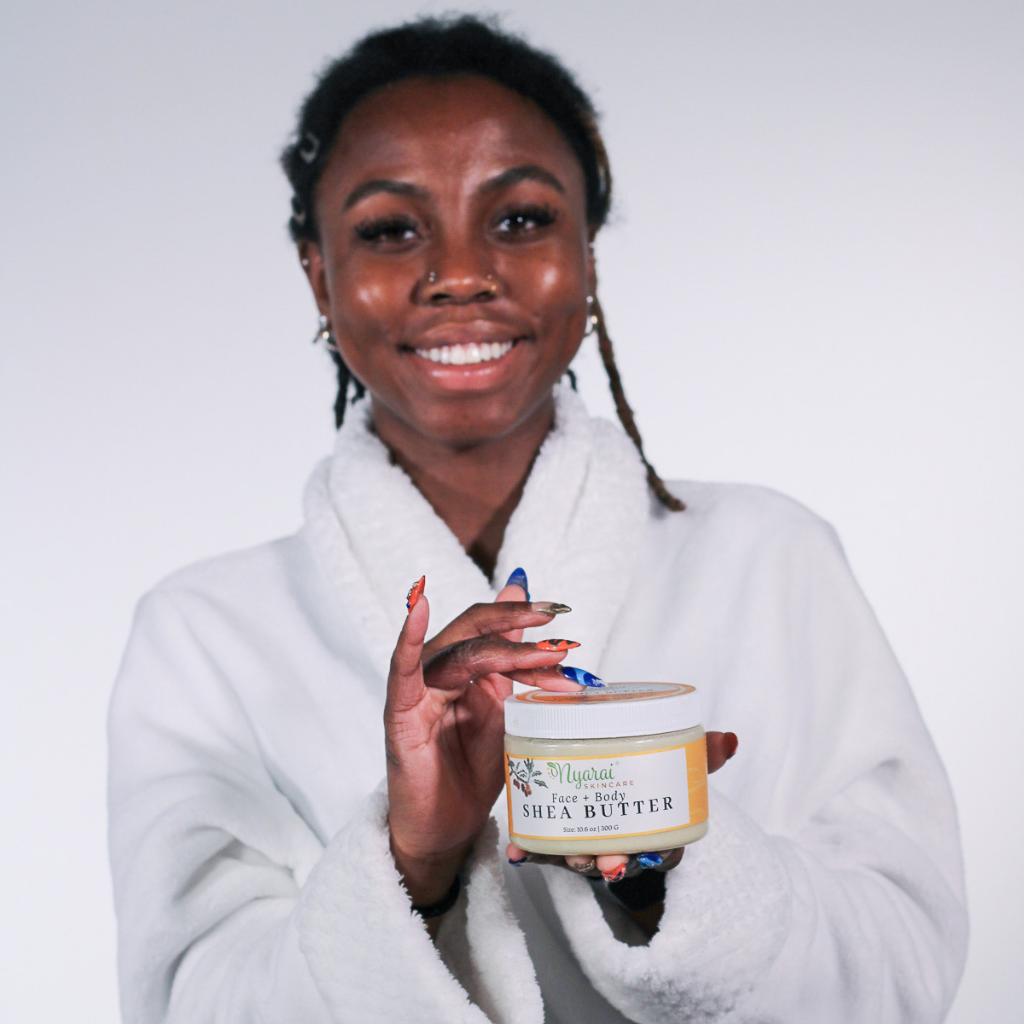 Woman holding Organic Raw Shea Butter - natural moisturizing skincare routine