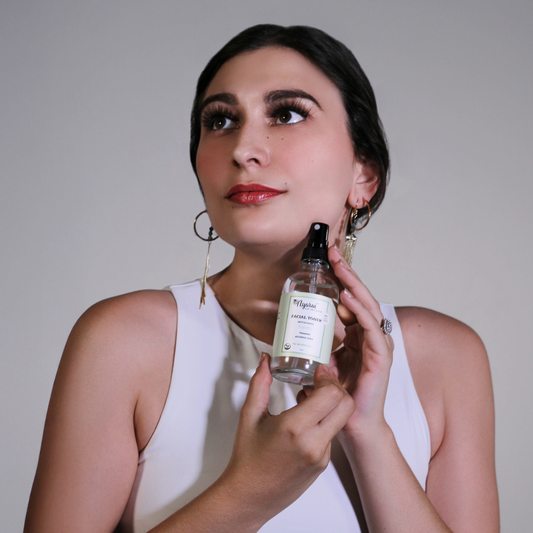 Woman following 5-step balancing skincare routine - complete bundle application