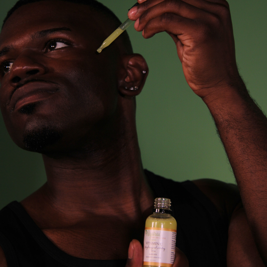 man applying Vitamin C Serum - natural brightening skincare routine
