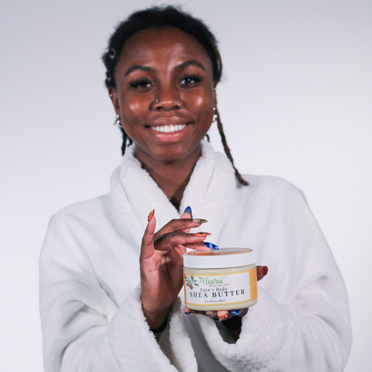 Woman holding Organic Raw Shea Butter - natural moisturizing skincare routine