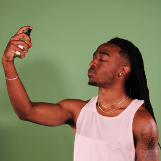 Man applying Rejuvenating Toner